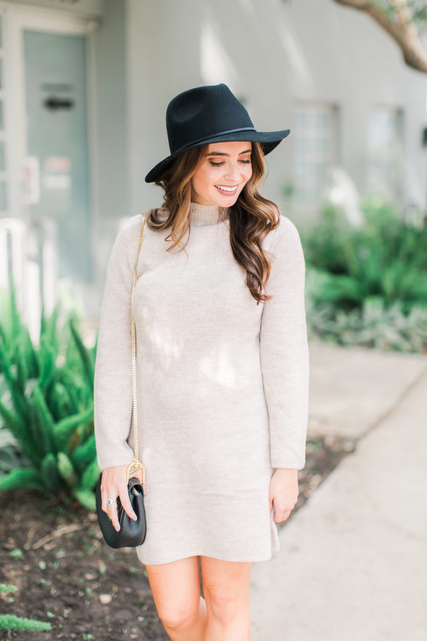 Maxie Elle | Neutral sweater dress with black hat and black booties - Wedding Skin Care Routine by popular Orange County style blogger Maxie Elle